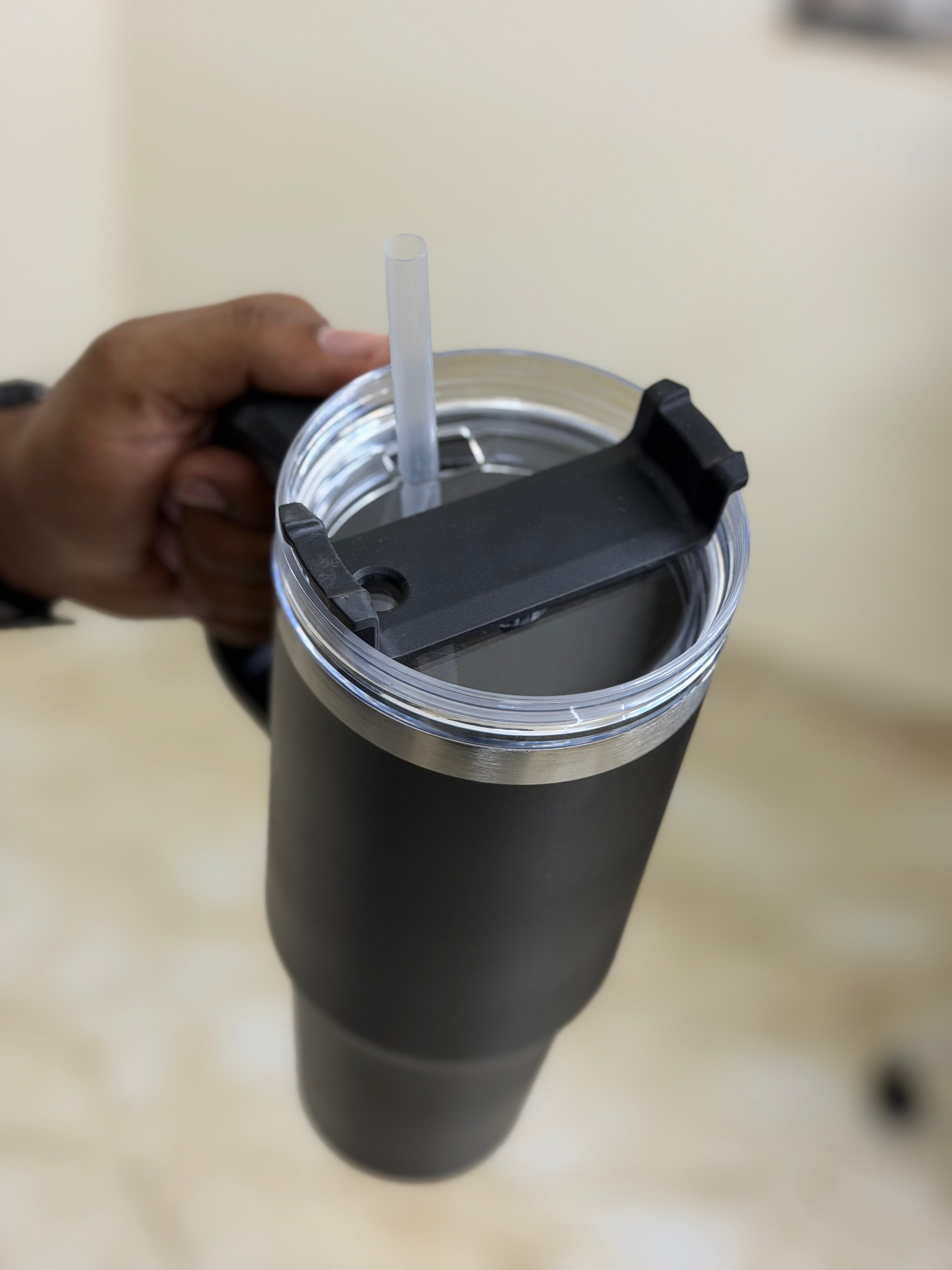 Black flask with transparent cap